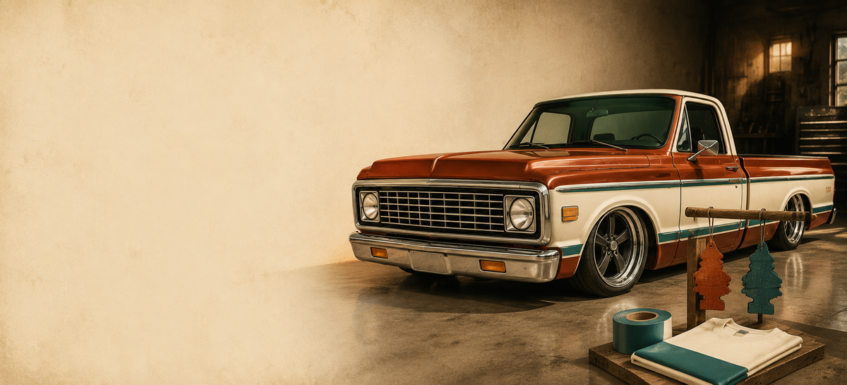 AMP Kustoms vintage homepage banner with orange and cream pickup, handmade freshies, vinyl and apparel